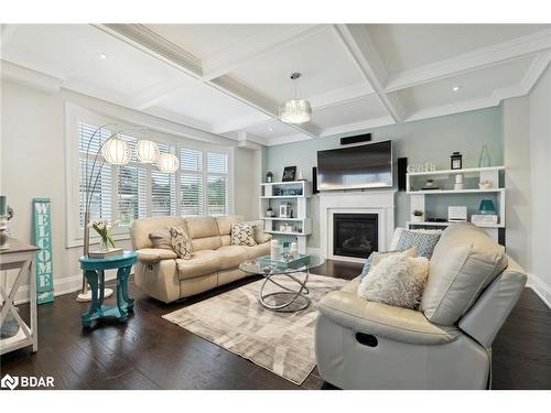 16 Oliver'S Mill Road Road, Springwater, ON - Indoor Photo Showing Living Room With Fireplace