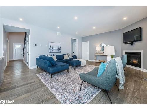 373373 6Th Line, Amaranth, ON - Indoor Photo Showing Living Room With Fireplace