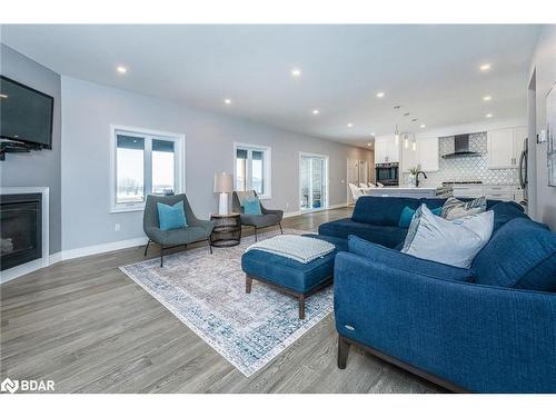 373373 6Th Line, Amaranth, ON - Indoor Photo Showing Living Room With Fireplace