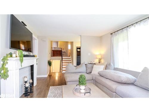 27 Highcroft Road, Barrie, ON - Indoor Photo Showing Living Room With Fireplace