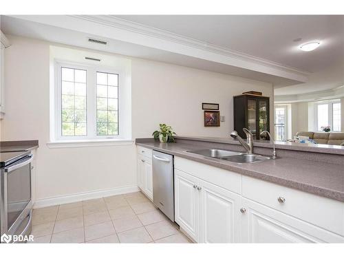 401-200 Collier Street, Barrie, ON - Indoor Photo Showing Kitchen With Double Sink