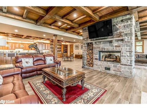 5 Monica Road, Tiny, ON - Indoor Photo Showing Living Room With Fireplace