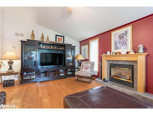 2 St James Place, Wasaga Beach, ON - Indoor Photo Showing Living Room With Fireplace