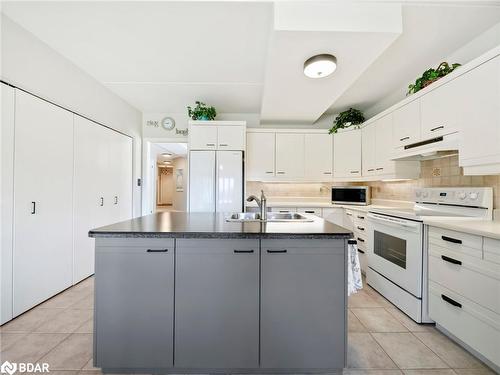 107-330 Brewery Lane, Orillia, ON - Indoor Photo Showing Kitchen With Double Sink