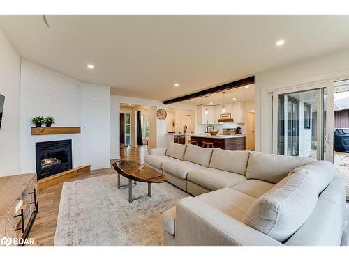 2557 Amigo Drive, Severn, ON - Indoor Photo Showing Living Room With Fireplace