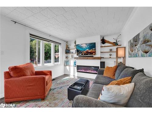 89 Wellington Street W, Barrie, ON - Indoor Photo Showing Living Room With Fireplace