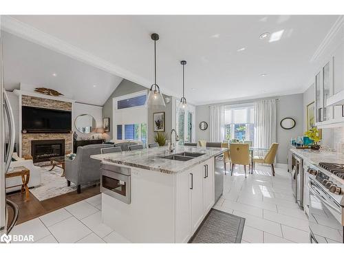 2248 Elana Drive, Severn, ON - Indoor Photo Showing Kitchen With Fireplace With Double Sink With Upgraded Kitchen