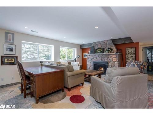 1139 River Lane, Severn Bridge, ON - Indoor Photo Showing Living Room With Fireplace