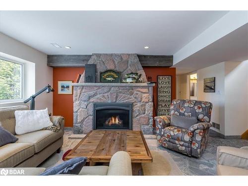 1139 River Lane, Severn Bridge, ON - Indoor Photo Showing Living Room With Fireplace