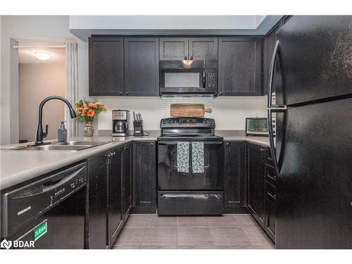 305-295 Cundles Road East Road E, Barrie, ON - Indoor Photo Showing Kitchen With Double Sink