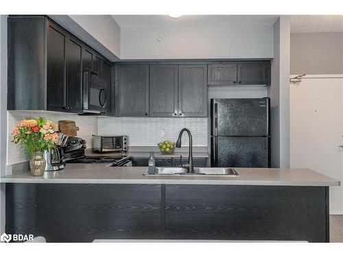 305-295 Cundles Road East Road E, Barrie, ON - Indoor Photo Showing Kitchen With Double Sink