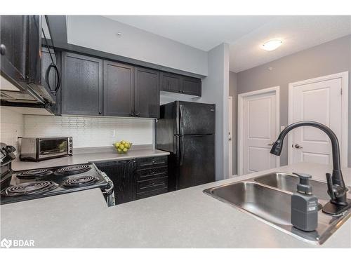 305-295 Cundles Road East Road E, Barrie, ON - Indoor Photo Showing Kitchen With Double Sink