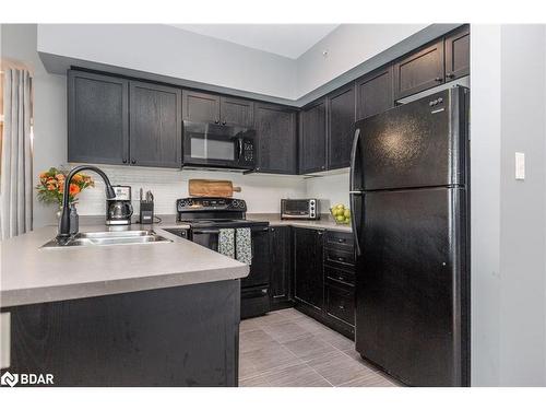 305-295 Cundles Road East Road E, Barrie, ON - Indoor Photo Showing Kitchen With Double Sink