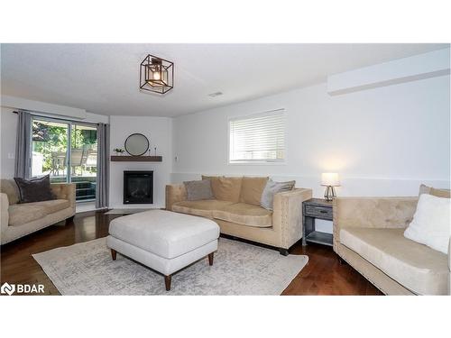 99 Churchland Drive, Barrie, ON - Indoor Photo Showing Living Room With Fireplace