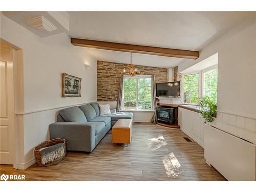 23 Pops Lane, Wasaga Beach, ON - Indoor Photo Showing Living Room With Fireplace