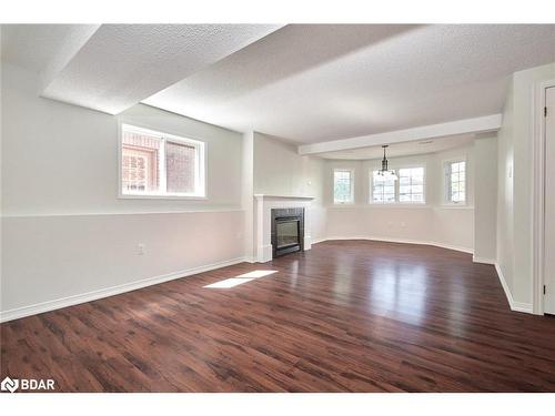 Lower-438 Sunnidale Road, Barrie, ON - Indoor Photo Showing Other Room With Fireplace