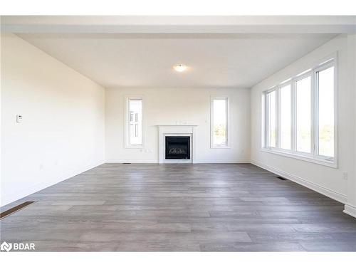 60 Wood Crescent, Angus, ON - Indoor Photo Showing Living Room With Fireplace