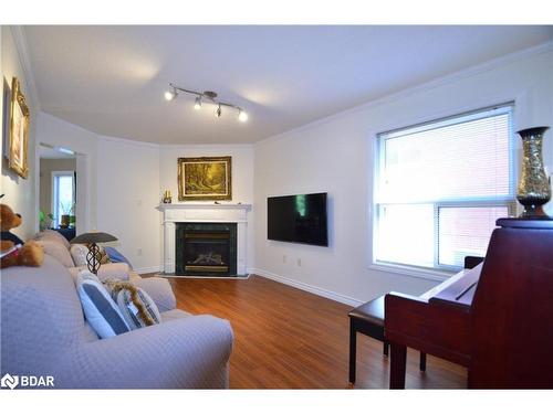 140 Country Lane, Barrie, ON - Indoor Photo Showing Living Room With Fireplace