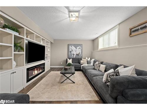 10 Deanna Drive, Wasaga Beach, ON - Indoor Photo Showing Living Room With Fireplace