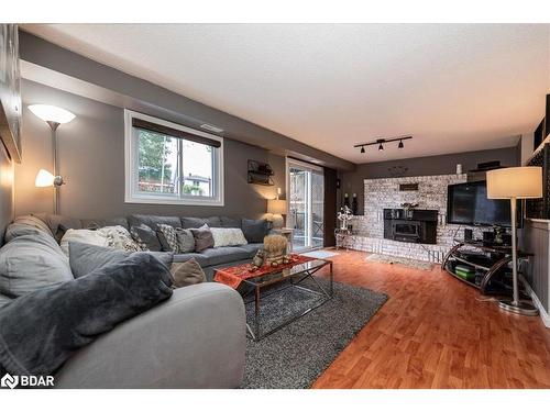 3 Sinclair Court, Barrie, ON - Indoor Photo Showing Living Room With Fireplace