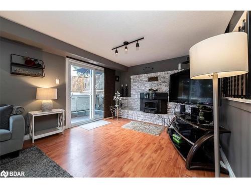 3 Sinclair Court, Barrie, ON - Indoor Photo Showing Living Room With Fireplace