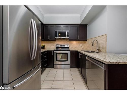 206-45 Ferndale Drive S, Barrie, ON - Indoor Photo Showing Kitchen With Stainless Steel Kitchen With Double Sink