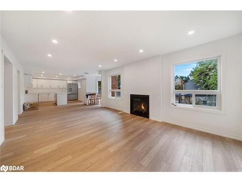 40 Ford Street, Barrie, ON - Indoor Photo Showing Other Room With Fireplace