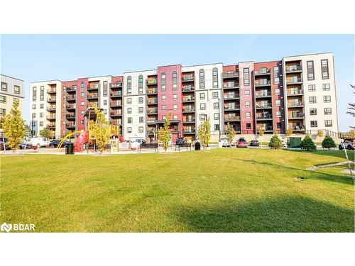 110-4 Spice Way Way, Barrie, ON - Outdoor With Balcony With Facade