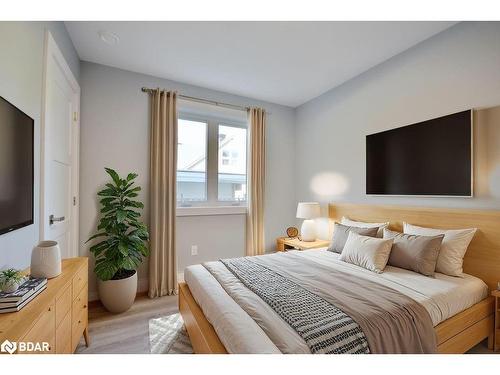 Upper-97 Queens Street, Barrie, ON - Indoor Photo Showing Bedroom