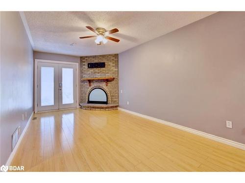 6843 Avila Road, Peel, ON - Indoor Photo Showing Other Room With Fireplace