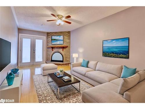 6843 Avila Road, Peel, ON - Indoor Photo Showing Living Room With Fireplace