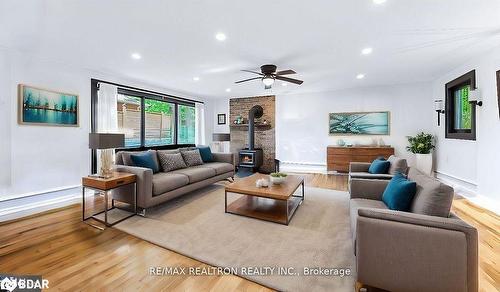 6 Mill Street E, Springwater, ON - Indoor Photo Showing Living Room