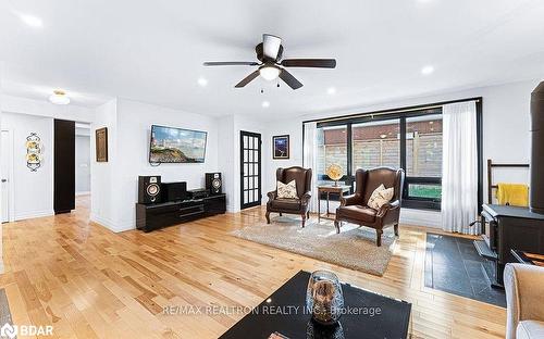 6 Mill Street E, Springwater, ON - Indoor Photo Showing Living Room