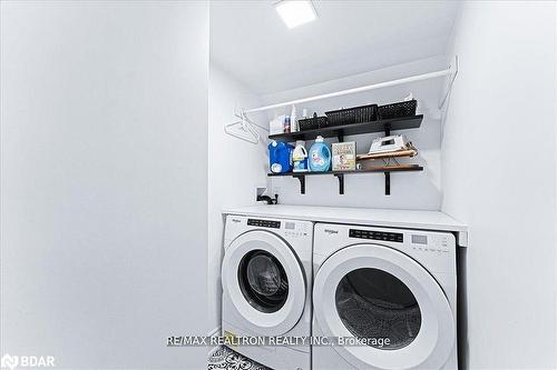 6 Mill Street E, Springwater, ON - Indoor Photo Showing Laundry Room