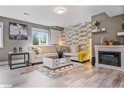 13 Bridle Trail, Midhurst, ON - Indoor Photo Showing Living Room With Fireplace