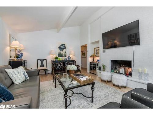 18 Maple Drive, Orillia, ON - Indoor Photo Showing Living Room With Fireplace