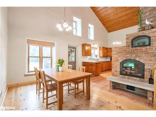 5745 Line 3 N, Oro-Medonte, ON - Indoor Photo Showing Dining Room With Fireplace