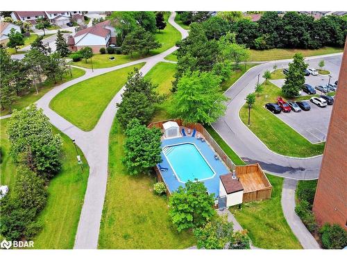 1013-6720 Glen Erin Drive, Mississauga, ON - Outdoor With In Ground Pool