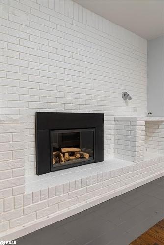 Lower-48 Ottaway Avenue, Barrie, ON - Indoor With Fireplace