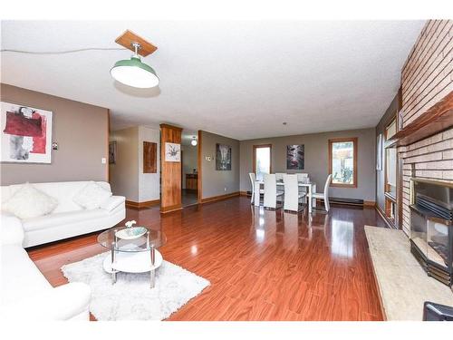 2146 Innisfil Beach Road, Innisfil, ON - Indoor Photo Showing Living Room With Fireplace