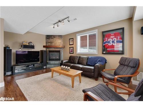 30 Capilano Court, Barrie, ON - Indoor Photo Showing Living Room With Fireplace