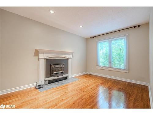 22 Macmillan Crescent, Barrie, ON - Indoor Photo Showing Living Room With Fireplace