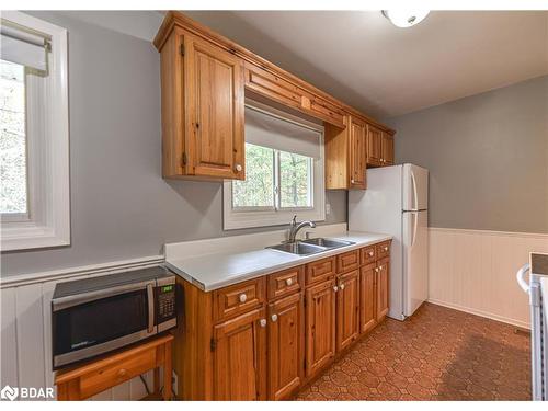 1528 Kitchen Side Road, Severn, ON - Indoor Photo Showing Kitchen With Double Sink