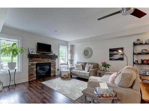 12 Masters Crescent, Port Severn, ON - Indoor Photo Showing Living Room With Fireplace