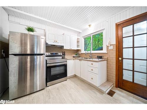 11 Bourgeois Court, Tiny, ON - Indoor Photo Showing Kitchen With Double Sink