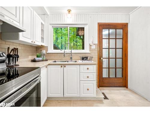 11 Bourgeois Court, Tiny, ON - Indoor Photo Showing Kitchen With Double Sink