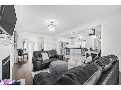 12 Cypress Point, Barrie, ON - Indoor Photo Showing Living Room With Fireplace