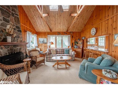 35 Campus Place, Innisfil, ON - Indoor Photo Showing Living Room With Fireplace