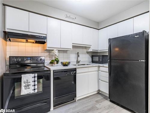 303-36 James Street S, Hamilton, ON - Indoor Photo Showing Kitchen With Double Sink