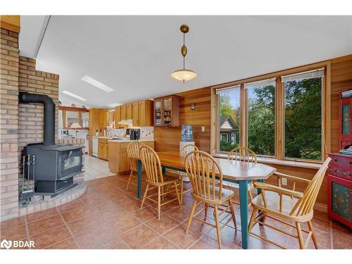 2396 Lakeshore Drive, Brechin, ON - Indoor Photo Showing Dining Room With Fireplace